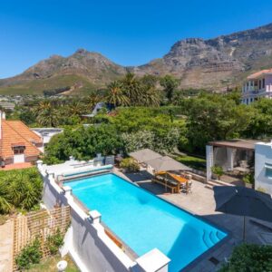 Abbey Manor Luxury Guesthouse: an aerial view of a house with a swimming pool