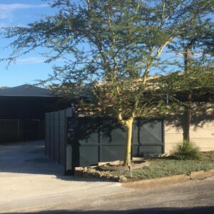 Ammabed Accommodation: a house with a tree next to a driveway
