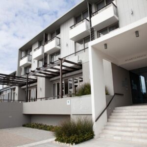 Atlantic Beach Hotel: an apartment building with stairs in front of it