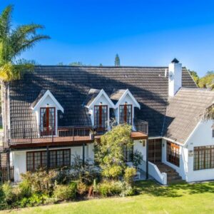 Be at Rest Accommodation: a white house with a black roof