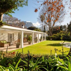 Beluga of Constantia Guest House: an exterior view of a house with a yard