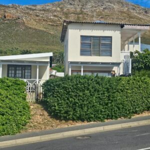 Boulders Bay Village: a white house on the side of a hill