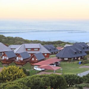 Brenton on Sea Cottages: an aerial view of a home with houses