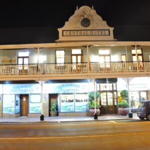 Central Hotel Guest House: a building with a balcony on the side of a street
