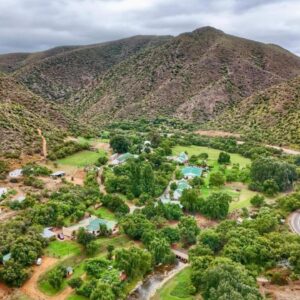 De Oude Meul Country Lodge & Restaurant: an aerial view of a village in a mountain