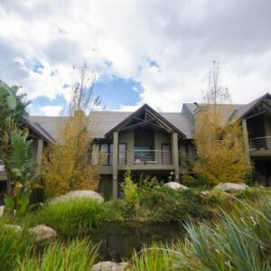 Du Kloof Lodge: an exterior view of a house with mountains in the background