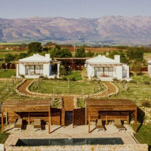 Duikersdrift Winelands Country Escape: an aerial view of a resort with mountains in the background
