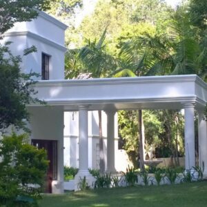 Edenbrook Country Manor: a white house with trees in front of it