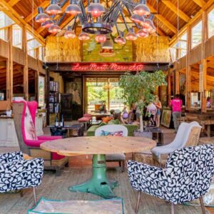 Extraordinary Barn Loft at Animal Sanctuary: a restaurant with a table and chairs in a building