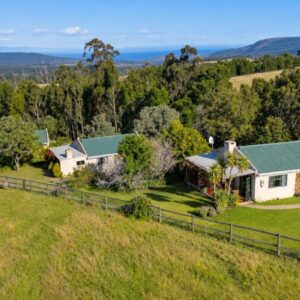 Fernhill Guest Farm: an aerial view of a house on a hill
