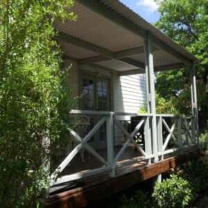 Five Mountains Guest Farm & Spa: a screened porch on a house with trees
