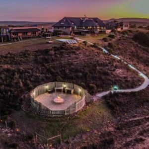 Hartenbos Private Game Lodge: an overhead view of a house with a road leading to it