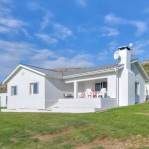 Jack's Place: a white house with a large yard