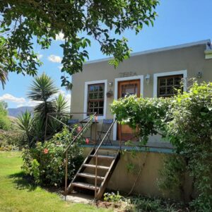 Karoo Life B&B: a house with a staircase in front of it