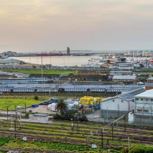 Luxury Woodstock Studio Apartments: a city with a train yard and a harbor