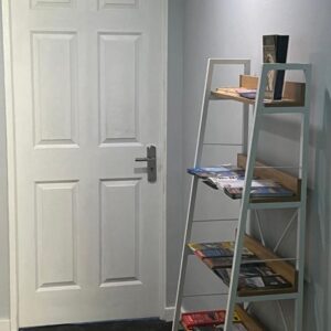 M and B MotherCity Backpackers: a ladder in front of a white door