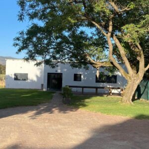 Magents Farm Guesthouse: a white building with a tree in front of it