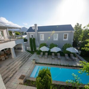 Maison d'Ail Guest House: an aerial view of a house with a swimming pool