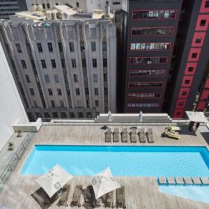 Mandela Rhodes Place: an overhead view of a swimming pool on top of a building