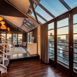 Manhattan Lofts: a balcony with a spiral staircase in a building