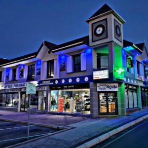 Mile Crunchers Backpackers & Hostelling: a building with a clock tower on a street