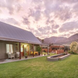 Mirihof Retreat and Olive Estate: a house with a yard with a view of the mountains