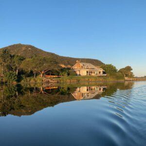 Moonriver Self Catering: a house on the shore of a body of water