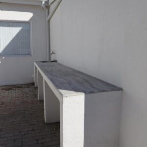 Namaqua Lodge: a white building with a gray roof on it