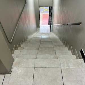Ngena Sleep & Go Bellville CBD: a long hallway with stairs in a building
