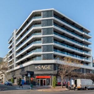 Sage Apartments by Propr: a tall apartment building on a city street