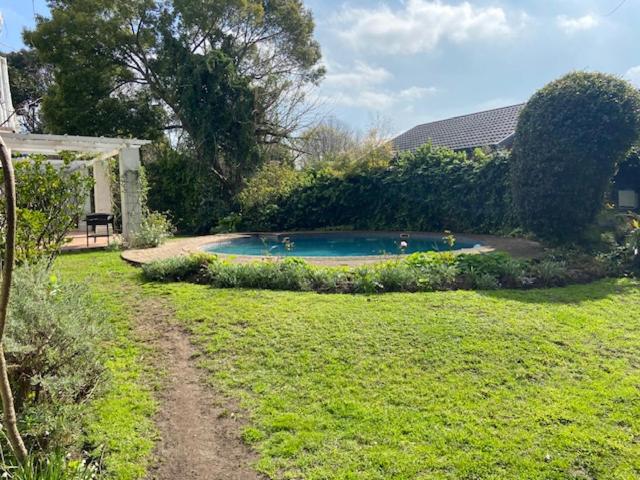 Sarah's Place- Heatherlands,George: a swimming pool in the yard of a house