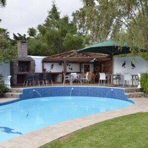 Somer Place B&B: a swimming pool in the backyard of a house