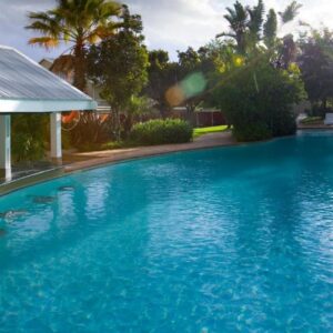 The Caledon Hotel and Spa: a swimming pool in a house with blue water