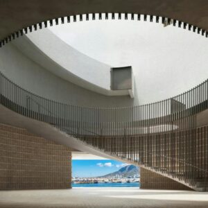 The Cape Town EDITION: a building with a circular ceiling with a large mirror