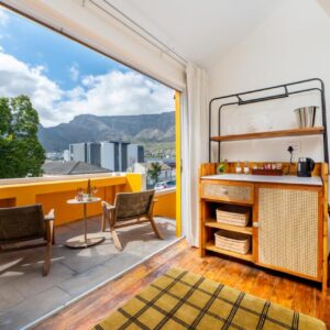 The Quorum Guest House: a room with a balcony with a view