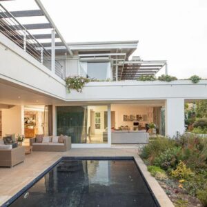 Thirty On Grace: a house with a swimming pool in a yard