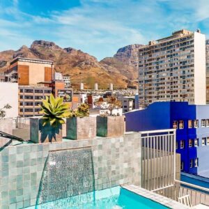 Urban Oasis Aparthotel: a view from the roof of a building with mountains in the background