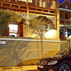 Wilton Manor: a black car parked in front of a building